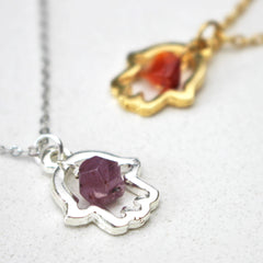 close up of Lucky Hamsa Birthstone Charm Necklace silver and gold