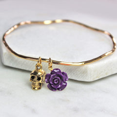 Gold skull bangle with purple rose