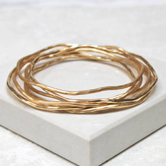 Gold stacking bangle set