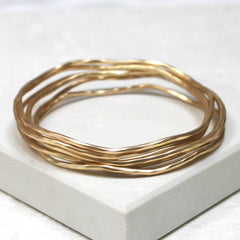 Matt gold stacking bangle set