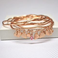 Gold gold bracelet set with personalised heart charms