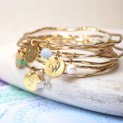 Close up of Personalised Family Birthstone Charm Bangle stacked