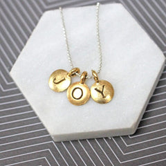 Close up of Personalised Three Letter Necklace gold