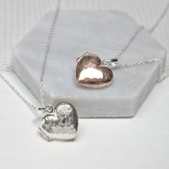 Close up of Personalised Message Heart Locket Necklace silver and rose gold