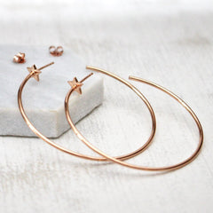 Close up of Star Hoop Earrings rose gold