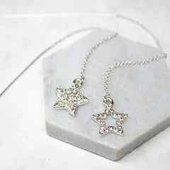 Close up of Diamante Star Thread Through Earrings silver