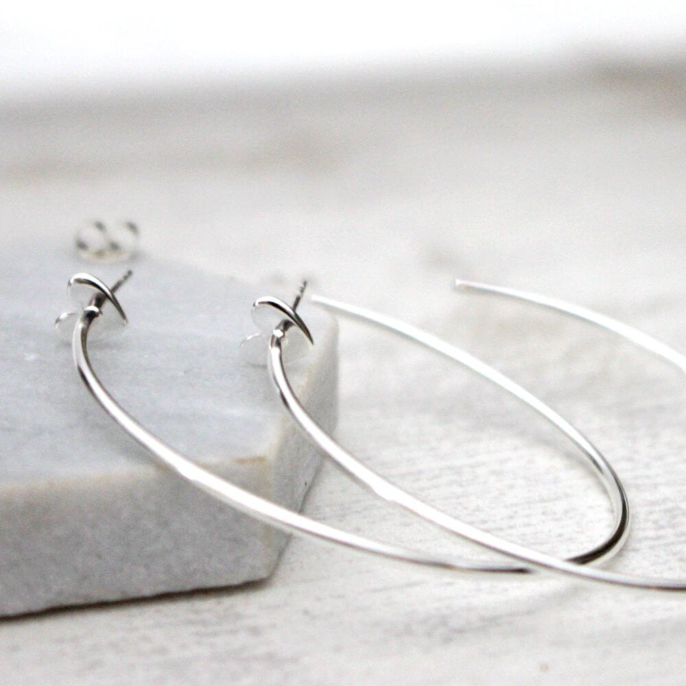 Close up of Heart Hoop Earrings silver