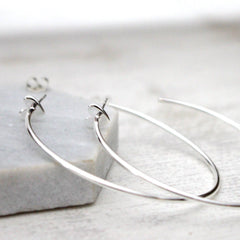 Close up of Heart Hoop Earrings silver