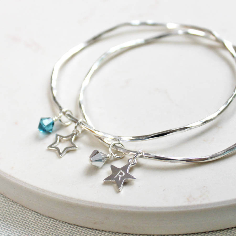 Silver personalised bangle with star charm and crystals.