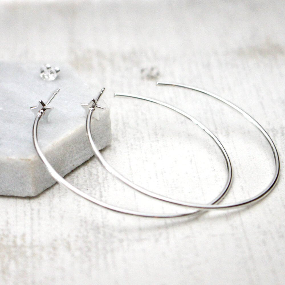 Close up of Star Hoop Earrings sterling silver