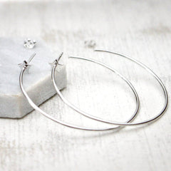 Close up of Star Hoop Earrings sterling silver