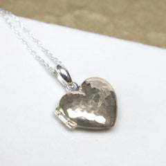 Close up of Personalised Message Heart Locket Necklace silver