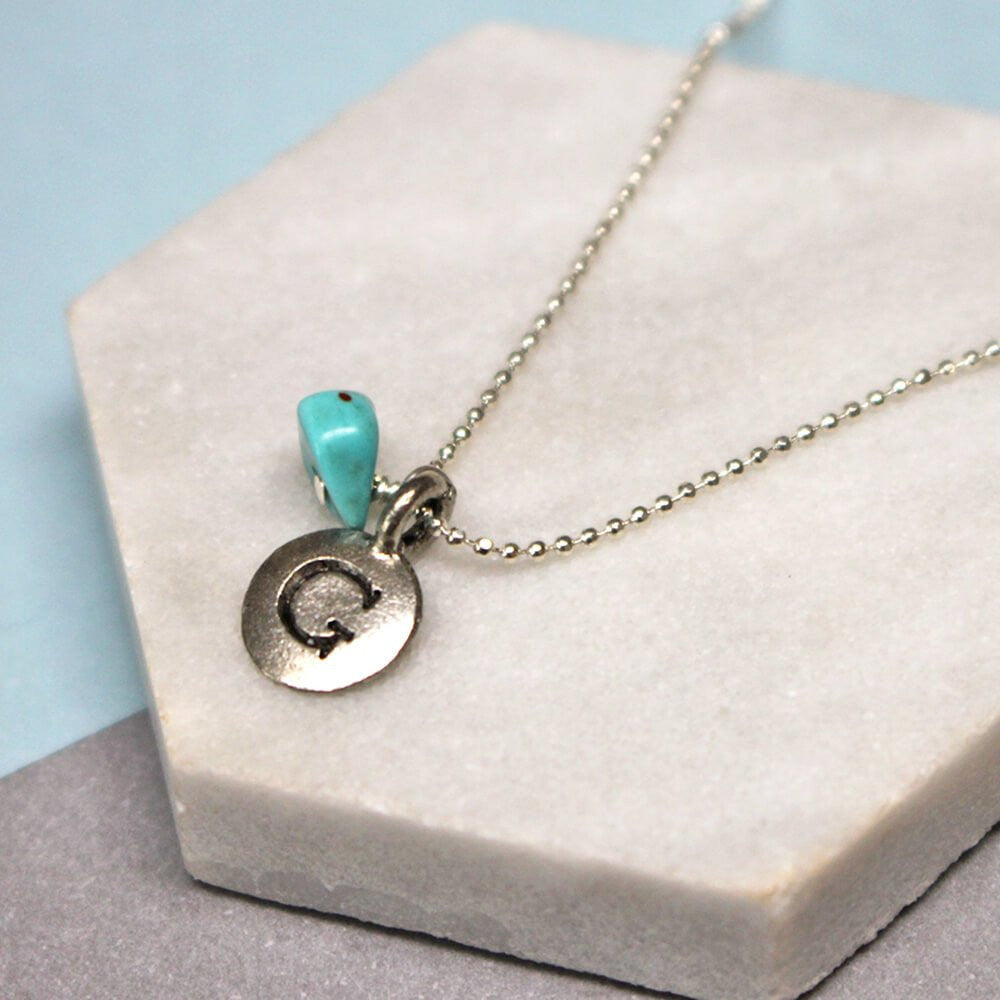 Close up of Personalised Initial Birthstone Necklace silver