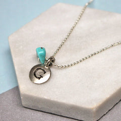 Close up of Personalised Initial Birthstone Necklace silver