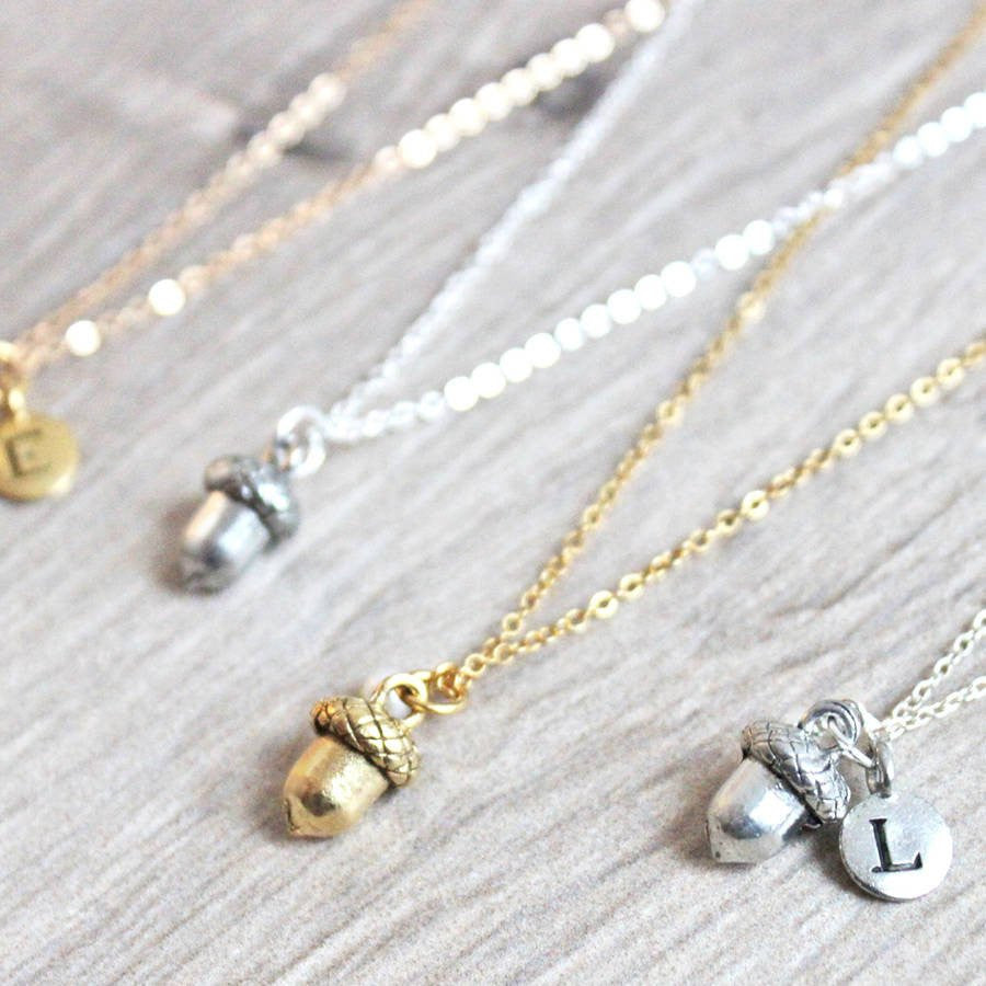 Close up of Acorn Necklace, silver with letter charm and gold