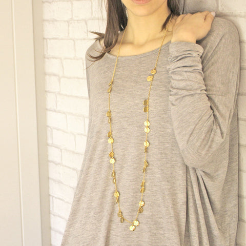 Our popular and timeless Chains of Gold Necklace is wonderfully versatil...
