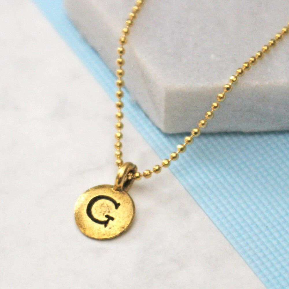 Close up of Bespoke Initial Necklace gold