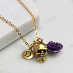 Gold skull initial necklace with purple rose