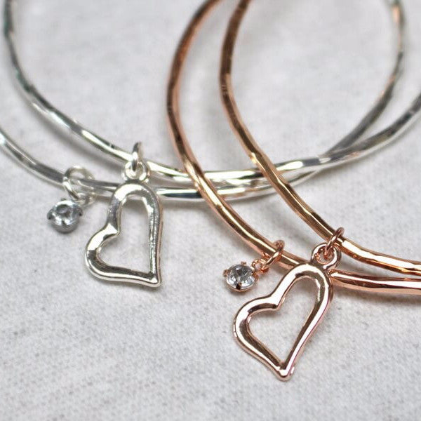 Close up of heart and diamante charm detail on love heart stacking bangle