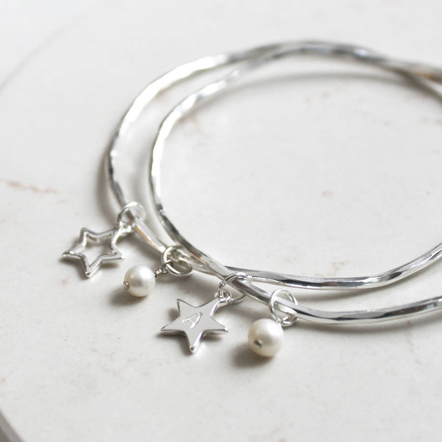 Sterling silver plated bangle with open or solid star and freshwater pearls