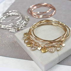 Rose gold, silver and gold bangle sets of diamante heart charms, perfect personalised gift for her
