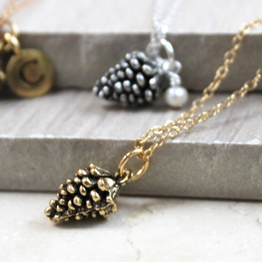 close up of Pine Cone Necklace, gold