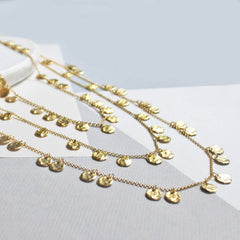 Full set of chains of gold necklaces shown in gold