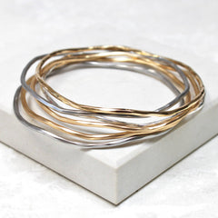 Silver and gold stacking bangles