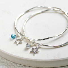 Silver personalised bangle with star charm and crystals. 