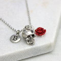Silver skull initial necklace with red rose