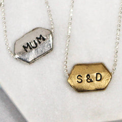 Mum and lovers word necklace in silver and gold