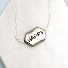 Hand stamped happy word necklace in silver