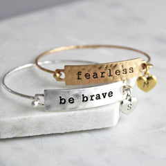 Gold fearless mantra bracelet and silver be brave mantra bracelet